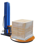 Workhorse Industrial Pallet Wrapping Machine With 4409 Pounds Capacity And 65 Inch Turntable Featuring Forklift Hole For Bulletproof Shrink Wrap Sealing On Massive Loads 110V with wrapped boxes on turntable.