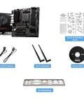 B550M-VC Pro Series Micro ATX motherboard with accessories including WiFi antenna, SATA cables, I/O shield, driver DVD, manual