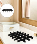 Adjustable Jewelry Organizer With Ultra Soft Sponge Lining And Removable Grid Dividers, black grid layout on vanity countertop.