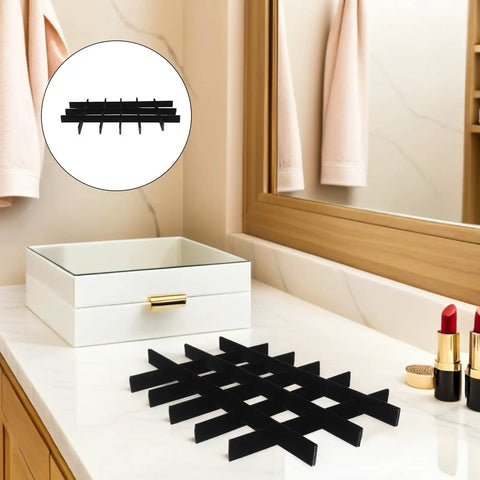Adjustable Jewelry Organizer With Ultra Soft Sponge Lining And Removable Grid Dividers, black grid layout on vanity countertop.