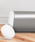 Heavy Duty Beefed Up Furniture Glide Pins Set For Hard Floors With Plastic And Iron Build next to floor and chair leg.