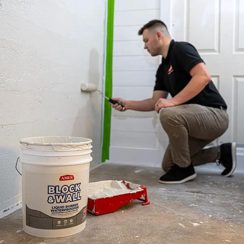 Man applying Block And Wall Liquid Rubber Waterproofer Pro Grade Multi Purpose Coating And Sealant For Concrete Walls And Foundations 1 Gallon White Made In USA Waterproof Basement Sealer