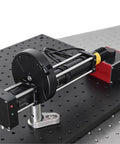 Six Position 1 Inch Telescope Filter Wheel Made From Aluminum Alloy With Sunshade Cover on optical bench for night imaging.