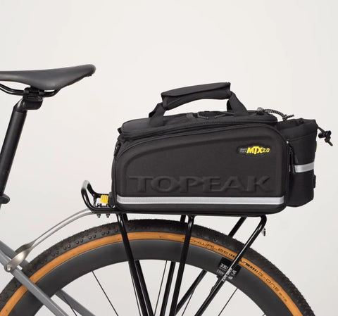 MTX 2.0 TrunkBag DXP with Expandable Panniers for Bike Rack mounted on bicycle, 22.6L capacity, black 600D polyester.