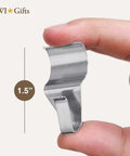 View of Low Profile 1.5 Inch No Hole Hook For Vinyl Siding Gray, Rust Proof Stainless Steel Seam Gripper held between fingers, 1.5-inch size shown