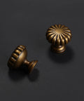 10 Pack Antique Brass Kitchen Cabinet Knobs Set With Retro Drawer Hardware Aged Bronze Zinc Alloy Handles showcased on dark surface