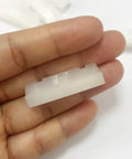 Close-up of 4 Pieces Toilet Seat Bumpers Replacement Kit for Quiet Close Lids, rubber cushion detail, durable ABS material