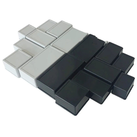 Durable White Plastic Junction Box For Organizing Cables In Control Panels Outdoor Installations And Home Appliances With Sturdy ABS Build. Various sizes in black and white.