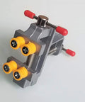 Rock Solid Mini Bench Vise Slick Portable Aluminum Table Clamp With Adjustable Jaw Pins on a table for precision part holding.