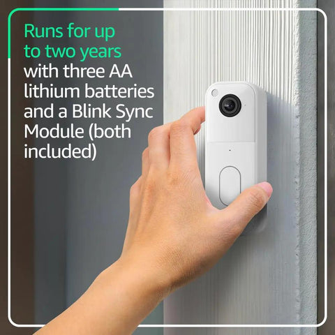 Wireless Smart Home Security Video Doorbell Offering Rock Solid Head To Toe HD View And Two Year Battery Life With No Sweat Easy Setup including a hand mounting the doorbell on a wall.