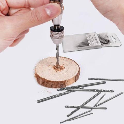 Rock Solid Aluminum Hand Pin Vise Kit Hella Tough 0.8mm To 3.0mm Micro Twist Drill Bits in action on wooden surface.