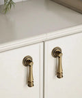 Retro Vintage Brass Cabinet Knob 2.8 Inch Single Hole Dresser Pull In Antique Bronze Finish on white cupboard doors