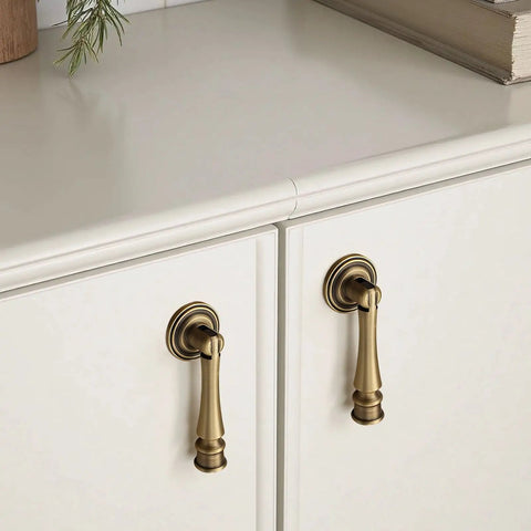 Retro Vintage Brass Cabinet Knob 2.8 Inch Single Hole Dresser Pull In Antique Bronze Finish on white cupboard doors