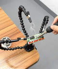Three Adjustable Gooseneck Arms Third Hand Soldering Tool For PCB Assembly And Jewelry Crafts in use on a workbench.