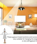 Heavy Duty Gypsum Board Expansion Screws With Nylon Butterfly Anchors Deliver Badass Hold in white, ideal for hanging on soft walls.