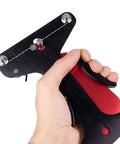 Close-up of a hand holding a black aluminum Bike Spoke Tension Meter With Caliper Aluminum Alloy Spoke Gauge For Accurate Tension Readings