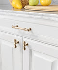 10 Pack 3.75 Inch Brushed Brass Cabinet Handles Gold Kitchen Cabinet Pulls For Cupboards And Drawers installed on white cabinets