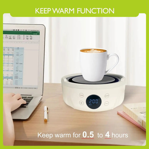 Ultra Compact 600W Electric Mini Hot Plate With Nine Precise Heat Settings keeping a coffee cup warm on a desk next to a laptop.