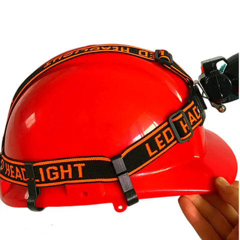 20 Pack Helmet Clips For Headlamp And Hard Hat Mounts installed on red helmet with LED headlight strap attachment