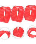 Five red silicone gauge protector sleeves with ribbed exterior
