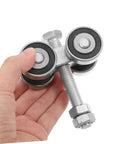 Top Shelf Stainless Steel Sliding Door Wheels Replacement Kit Featuring Dual Bearing Pulleys For Effortless Barn Door And Greenhouse Slider Upgrades That Roll Like Butter held in hand showing dual pulleys.