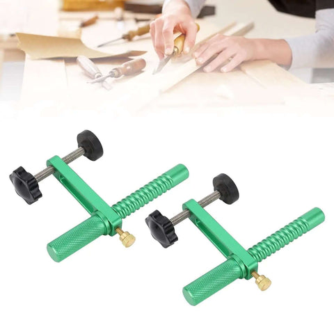 Two Pack 19mm Bench Dog Clamps With Quick Release Fast Acting Hold Down for woodworking, shown on a table with woodworking tools