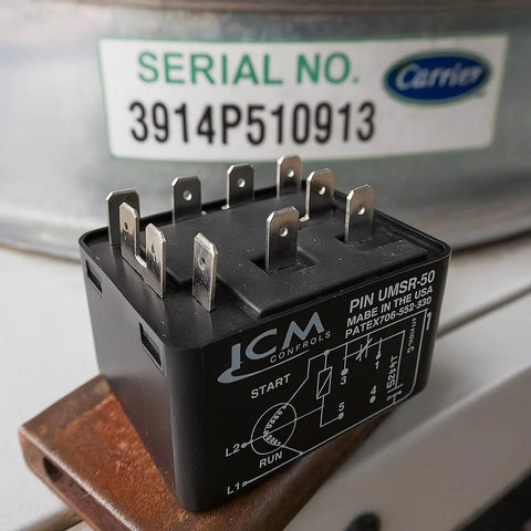 ICM UMSR-50 universal motor starting relay; black plastic housing with blade terminals
