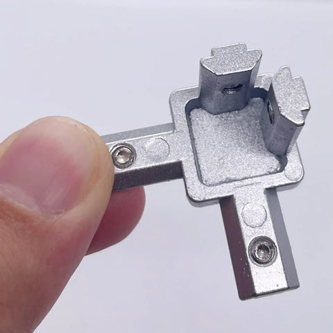 Close-up of 3-way bracket from 12 Sets 2020 Aluminum Extrusion Hardware Kit With 3 Way Brackets And Screws Includes 50 Pcs Set Screws And Wrench