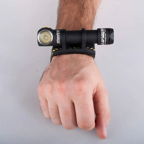 Wizard Pro V3 XHP50 Warm USB Magnetic Headlamp worn on wrist, showcasing compact design and durability
