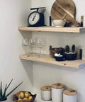 Heavy Duty 12 Inch L Shelf Brackets Set Black Metal Wall Mount Brackets With 5mm Thick Steel Includes Screws And Anchors For Sturdy Shelving In Home Garage Or Office supporting wooden shelves with kitchen items.