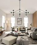 10 Light Modern Sputnik Chandelier In Matte Black With Globe Glass Shades For Dining Room, Kitchen Island, And Living Room, Industrial Chic, Easy Install, Statement Lighting Fixture For Modern Homes in living room setting.