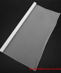 Nonstick PTFE Film Roll For Heat Press Transfers And Craft Projects, Reusable Heat Mat Sheet unrolled on black background