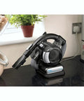 20V Max Flex Cordless Stick Vacuum With Floor Head And Pet Hair Brush on kitchen counter, quick charge docked