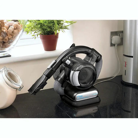 20V Max Flex Cordless Stick Vacuum With Floor Head And Pet Hair Brush on kitchen counter, quick charge docked