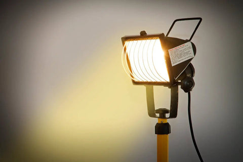 Image of a bright flood light illuminating a space, potentially using J Type T3 118mm 500W Halogen Bulbs Pack Of 5 R7S Base 120V Double Ended.