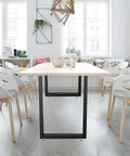 28 Inch Square Table Legs Set Black Industrial Bench Style Custom Furniture Leg Kit With Two Legs Includes Mounting Plates Adjustable Feet And All Hardware For Easy Assembly under a modern dining table in a bright room.