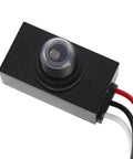 Black rectangular Exterior Dusk To Dawn Photocell Sensor with Auto On Off for Outdoor Lights, featuring red and black wires.