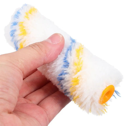 No Fuss 20 Piece Paint Roller Cover Set With Ergonomic Handle For Doors And Walls Loaded With Multi Size Foam Heads close-up of foam roller sleeve.