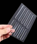 Hand holding sheet of self-adhesive rubber bumper strips for door slam prevention and furniture cushioning
