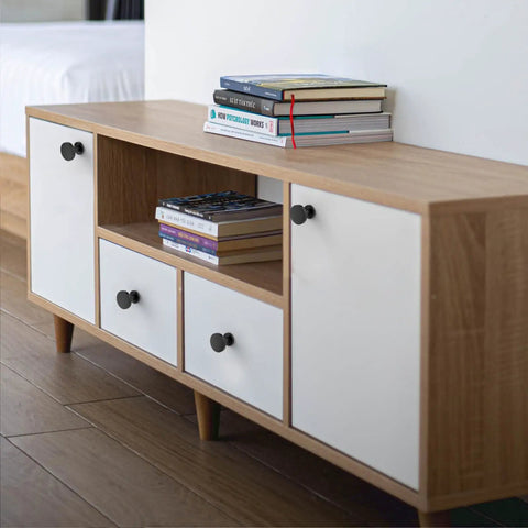 Fresh Round Matte Black Drawer Knobs 1.2 Inch Cabinet Hardware 10 Pack With Mounting Screws on white cabinetry with books.