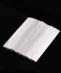 Stack of Pure Nickel Strip 99.6 Percent Nickel 0.15x6x50mm Solder Tabs for Battery Packs on black background