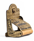 Antique Brass Wall Mount Toilet Paper Holder With Lid 6.9 Inch Wide Victorian Style Rust Resistant Solid Brass Bathroom Sanitary Paper Roll Holder Storage with ornate design and inscriptions.