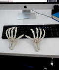 Left And Right Skeleton Hands 8 Inch Spooky Bones Halloween Decor on keyboard, realistic bone look, Crazy Bonez line