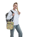 Person holding Desert Cactus Floral Insulated Lunch Tote for Office, Picnic and Camping with cactus print, lightweight design.