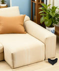 L shaped plastic furniture leg with M5 screws next to sofa, Sturdy L Shaped Plastic Furniture Legs With M5 Screws 4 Pack