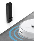 Heavy Duty Kick Down Door Stopper With Zero Drill Mount seen beside a robot vacuum on tiled floor, ideal for hands-free room security.