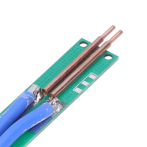 Pure Copper DIY Spot Welding Pen Kit with copper rods on green PCB for handheld electronics repair