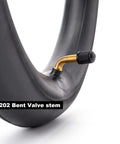Close-up of Heavy Duty 14x2.125 Inner Tube With Angled Valve Stem for Electric Scooters and E Bikes, gold valve detail