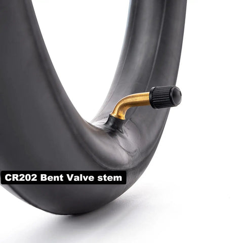 Close-up of Heavy Duty 14x2.125 Inner Tube With Angled Valve Stem for Electric Scooters and E Bikes, gold valve detail
