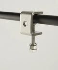 Close-up of a 1-inch 304 stainless steel C-clamp gripping a black metal rod